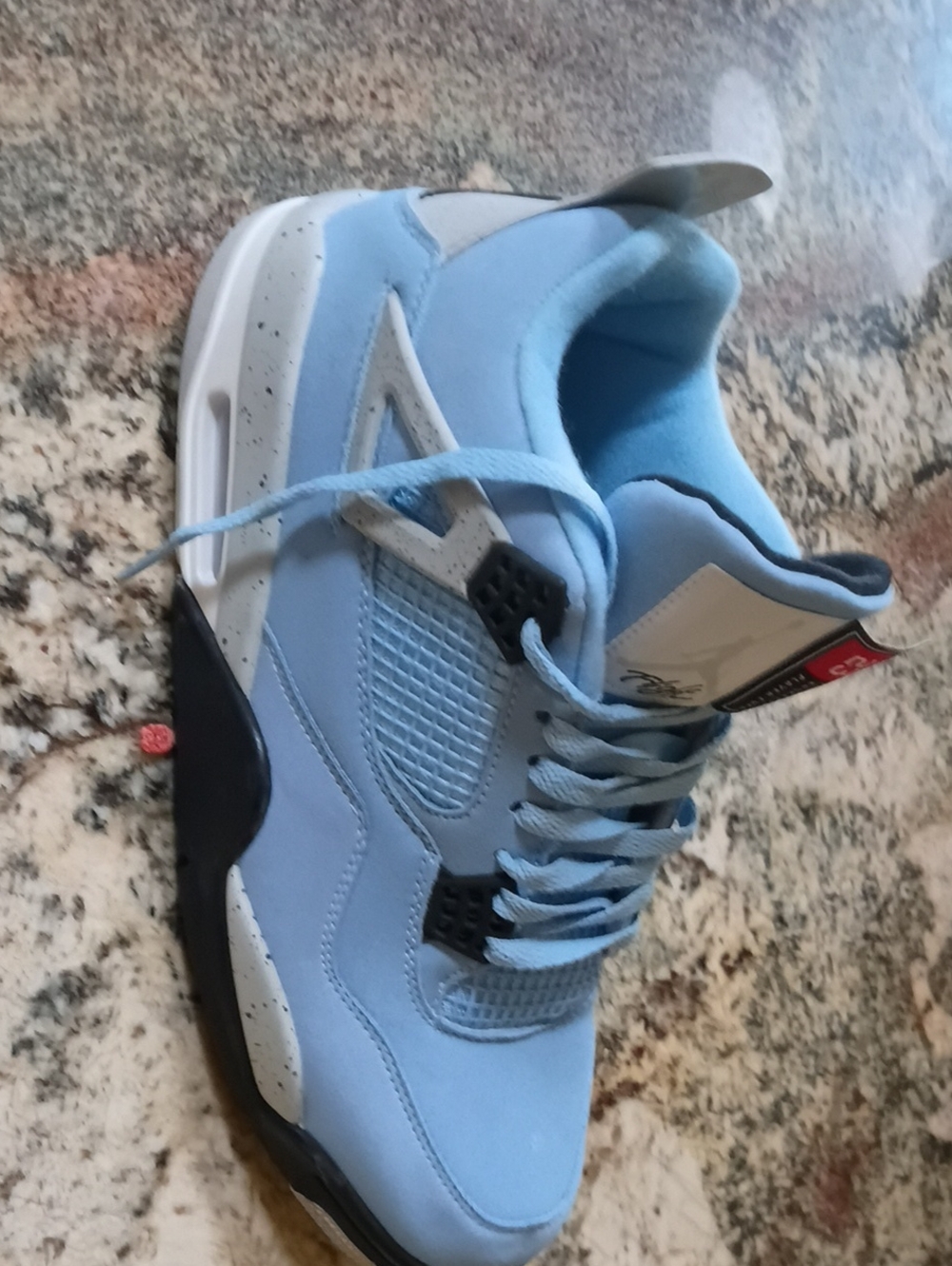 Jordan Light Blue and White Sneakers